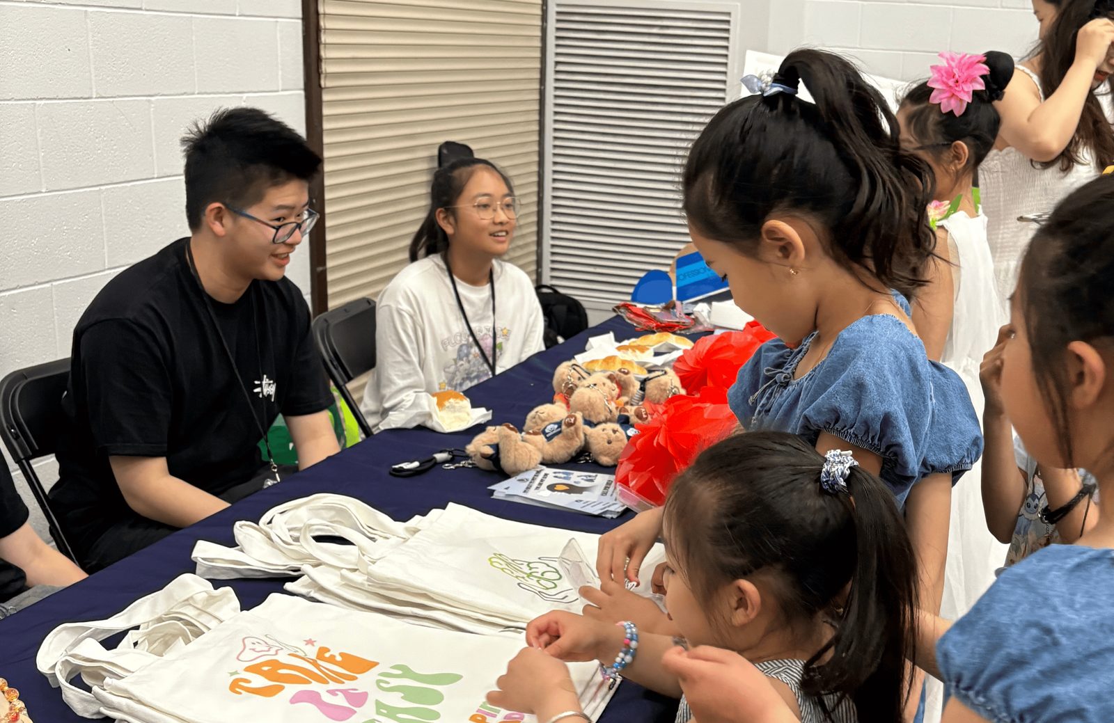 Volunteers engaging with children